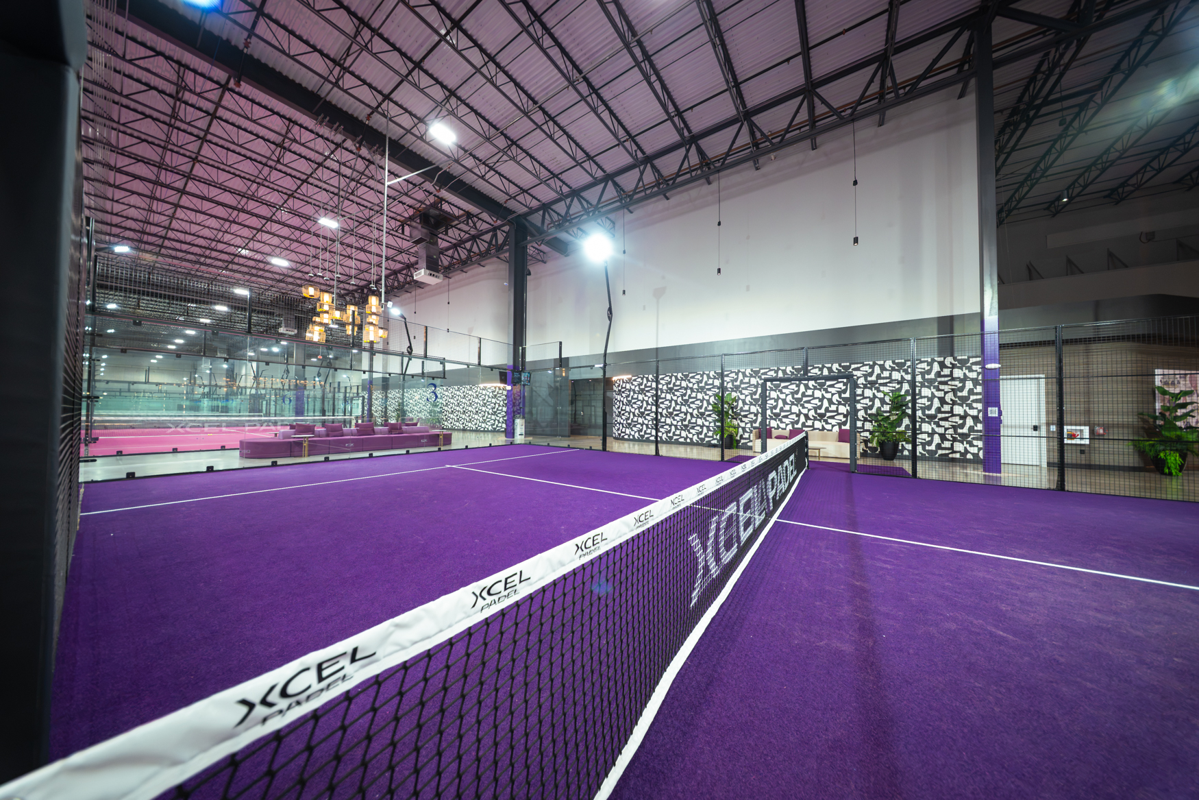 Xcel Padel indoor purple court with branded net